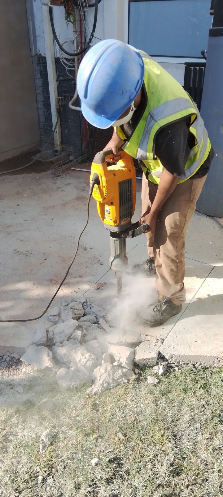 Burst pipe concrete breakout repair work by Dudley's Plumbers in Durban