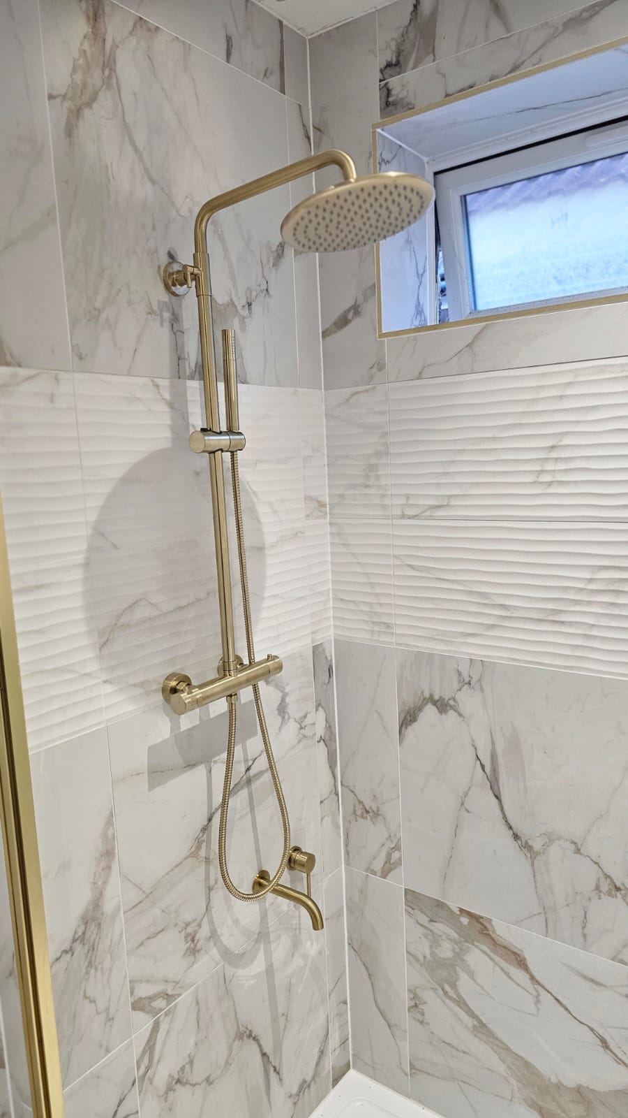 Gold rain shower Durban bathroom